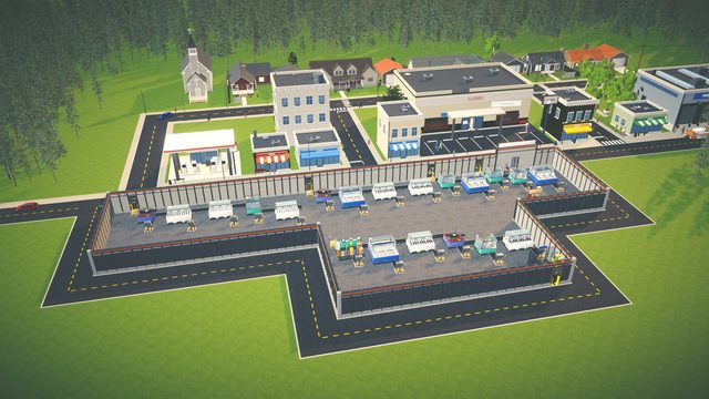 The factory with the town beyond