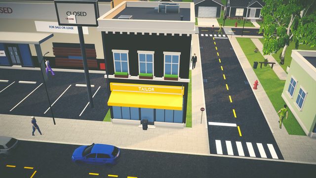 The town's main street with shops and traffic